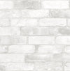 A close-up of York Wallcoverings Reclaimed Bricks Wallpaper, featuring white brick design with textured surface, visible mortar lines, and subtle shade variations for a realistic look.