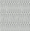 The Lars Retro Wave Wallpaper by York Wallcoverings features a repeating pattern of vertical, elongated oval shapes in dark gray, evenly spaced in rows and columns on a white background. The ovals exhibit a hand-drawn, slightly irregular appearance.