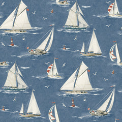 Chesapeake Leeward Sailboat Wallpaper by York Wallcoverings features a seamless pattern of sailboats with white sails gliding on blue water, accompanied by seagulls in flight and small lighthouses in the background. The design showcases a soft, hand-painted illustration style.
