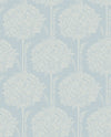 The Zaria Topiary Wallpaper by York Wallcoverings features a light blue background adorned with a repeating pattern of white, ornate, symmetrical floral bouquets and leafy branches, creating a classic and elegant vintage design.