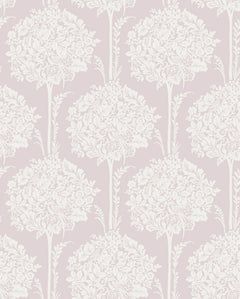 The Zaria Topiary Wallpaper by York Wallcoverings features an ornate white floral bouquet and leaf motif arranged in a seamless, repeating vertical pattern on a soft, pale pink background.