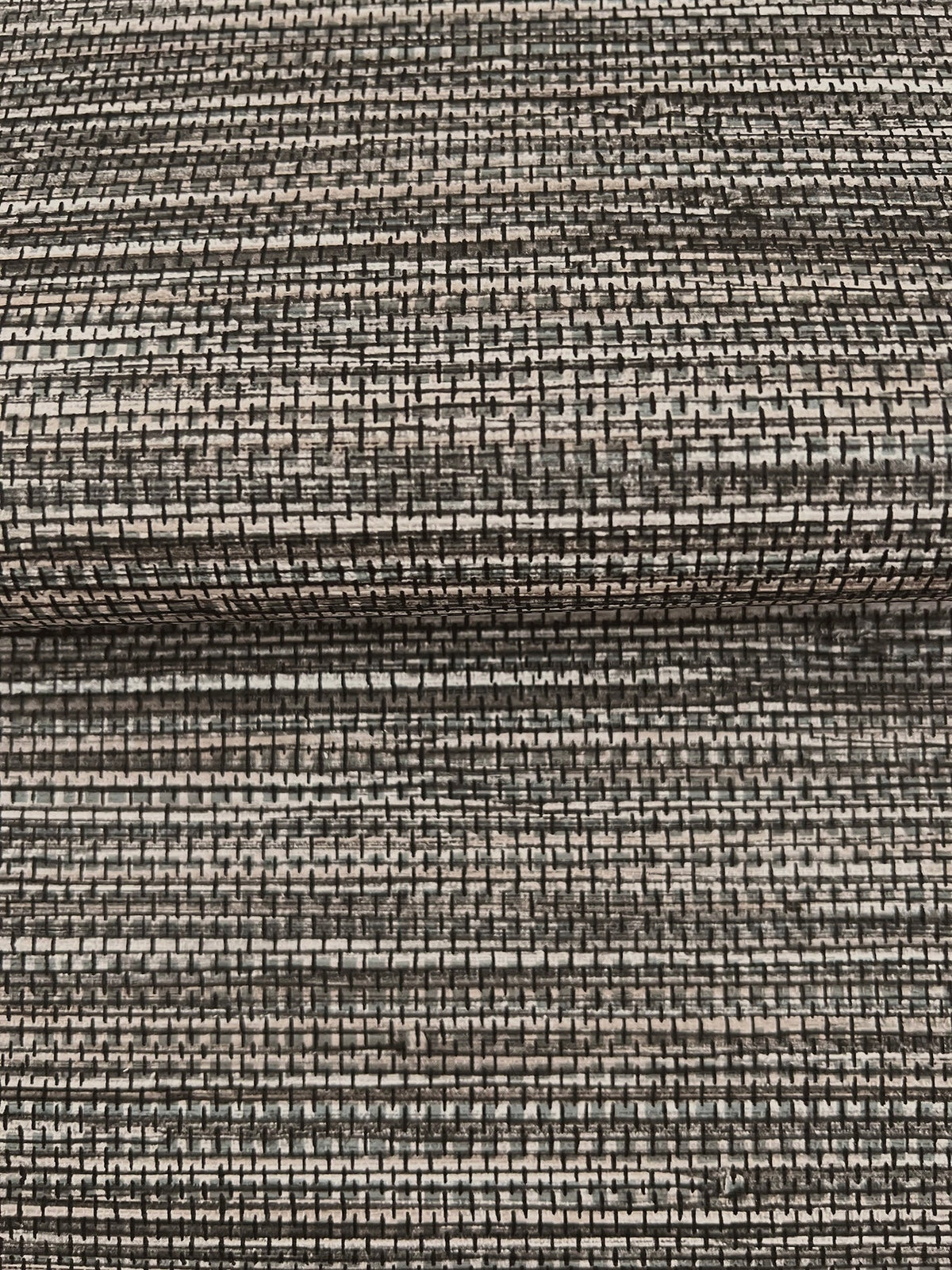 Winn Faux Grasscloth Wallpaper in a gray and black woven design with a textured, grid-like pattern.