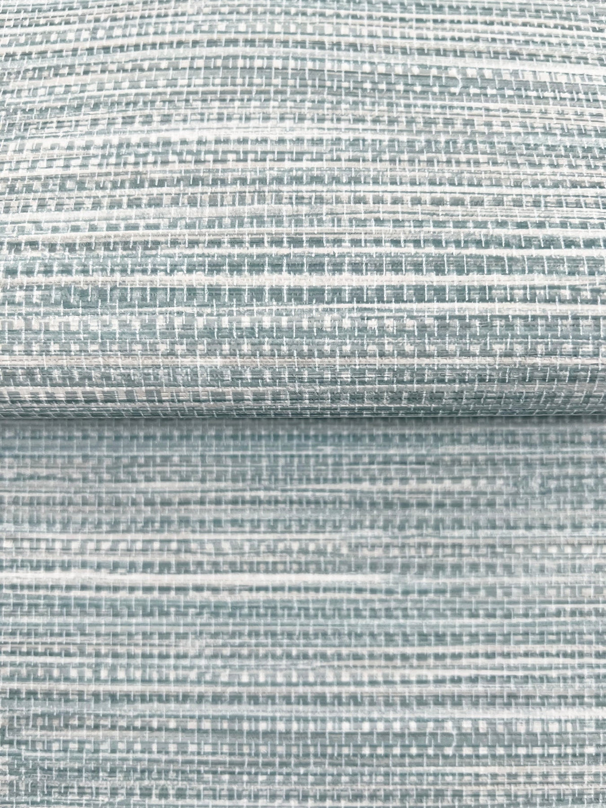 Winn Faux Grasscloth Wallpaper in blue-grey featuring a textured, woven horizontal pattern.