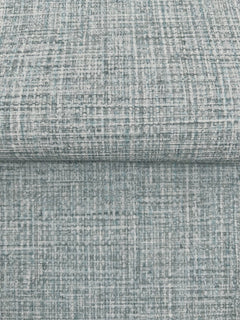 Clarkson Woven Wallpaper featuring a textured, woven pattern in shades of blue, gray, and white.