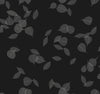 Myles Leaves Wallpaper featuring a pattern of translucent white leaf skeletons scattered across a black background.