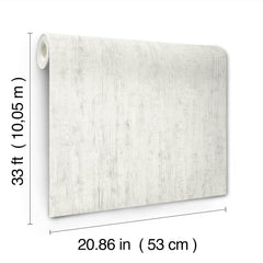 The Chesapeake Ramona Distressed Texture Wallpaper by York Wallcoverings is displayed, featuring a white textured pattern. The roll measures 33 ft (10.05 m) in length and 20.86 in (53 cm) in width.