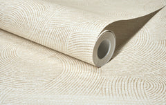 A partially unrolled roll of Chesapeake Harrison Swirling Geometric Wallpaper by York Wallcoverings in beige, featuring a subtle, textured pattern of curved and straight lines, displayed on a flat surface.