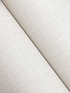 Close-up of two panels of Chesapeake Sonia Faux Linen Wallpaper by York Wallcoverings meeting at an angle, highlighting the off-white crosshatch texture and a subtle diagonal seam where the faux linen pattern intersects.