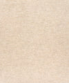 A close-up of the Chesapeake Tansy Distressed Wallpaper by York Wallcoverings shows a light beige surface with a subtle, woven appearance. The even and smooth texture highlights fine threads and the neutral color of this wallpaper design.