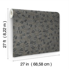 Ophidia Wallpaper by York Wallcoverings features a black, gray, and white abstract dotted pattern in a rolled format. The dimensions—27 feet (8.22 meters) in length and 27 inches (68.58 cm) in width—are displayed next to and below the roll.