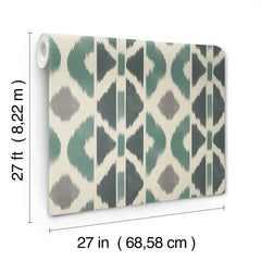 A roll of Patan Wallpaper by York Wallcoverings featuring a geometric pattern in teal, gray, and cream. The dimensions are 27 ft (8.22 m) long and 27 in (68.58 cm) wide.
