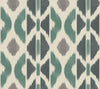 Experience the Patan Wallpaper by York Wallcoverings, featuring an abstract geometric pattern with symmetrical, vertical arrangements of repeating shapes in teal, gray, and dark green on an off-white background—evoking the look of a traditional ikat textile design.