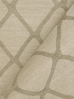 A close-up of Tonga Wallpaper by York Wallcoverings showcases its beige surface adorned with a geometric, interlocking diamond pattern in light brown, with the wallpaper partially folded to reveal both the front and reverse sides.