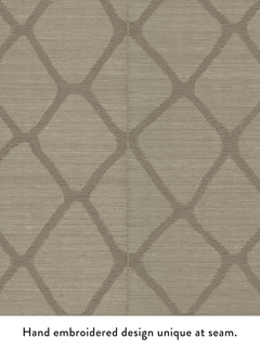 Tonga Wallpaper by York Wallcoverings features a beige background with a geometric, diamond-shaped hand-embroidered pattern. The design appears slightly misaligned at the central vertical seam.