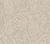Kashmir Dreams Paisley Wallpaper by York Wallcoverings features an intricate blend of beige and cream paisley patterns, adorned with densely packed floral and leaf motifs. The swirling shapes and fine lines create a soft, detailed, and vintage-inspired look throughout the design.