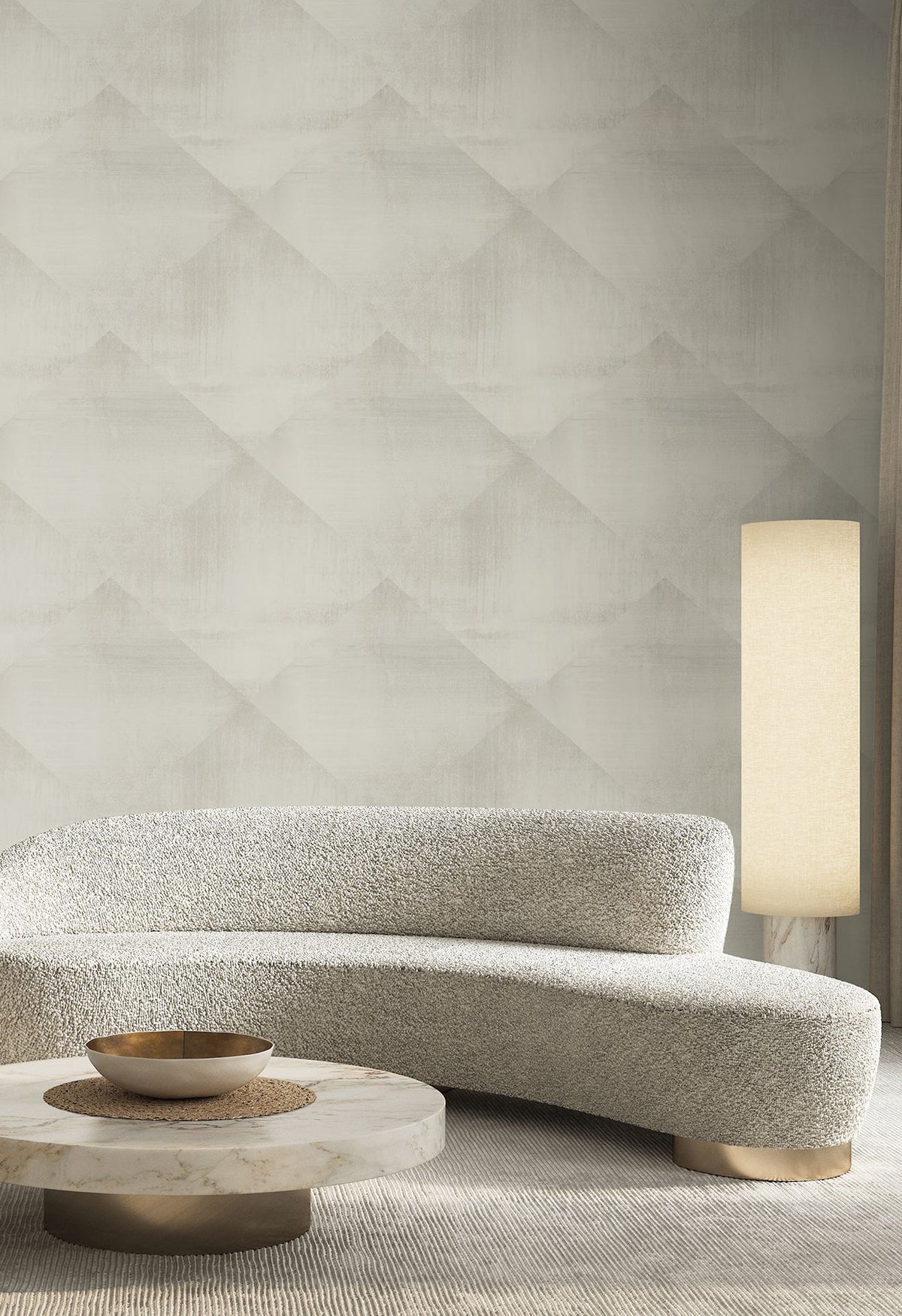 In Clay Wallpaper featuring a subtle, light gray diamond pattern displayed in a modern living room with a curved sofa and a cylindrical floor lamp.