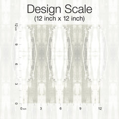 Abstract grayscale pattern with mirrored vertical shapes. A black scale on the left and bottom edges marks inches from 0 to 12. Text above reads: Escalante Wallpaper – Design Scale (12 inch x 12 inch), York Wallcoverings.