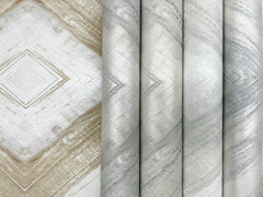 Ballad Wallpaper rolls showing a repeating diamond or chevron pattern in neutral shades of beige, gray, and silver.