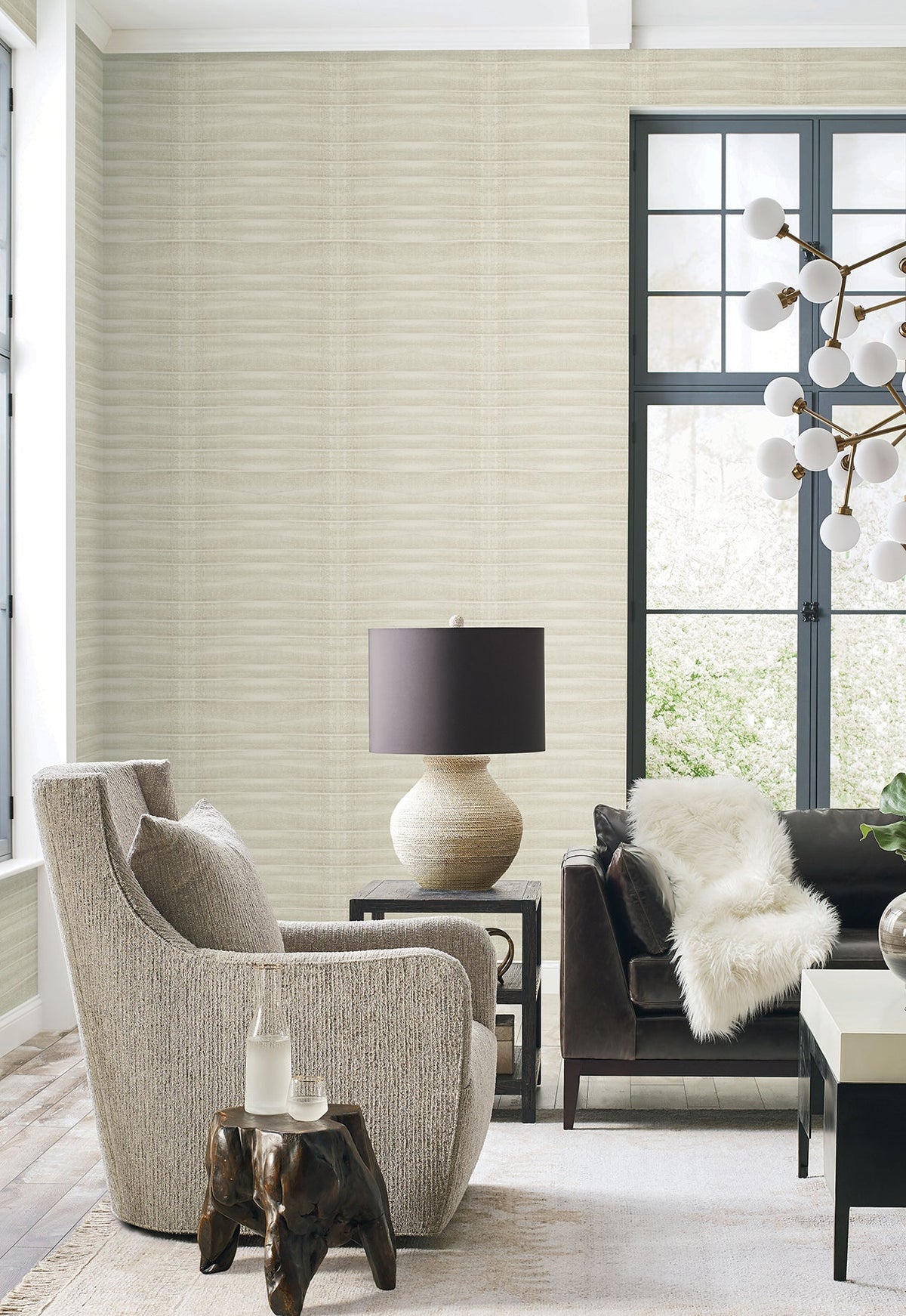 Grey Stone Wallpaper by York Wallcoverings in light grey with a subtle, horizontal textured pattern on a living room wall.