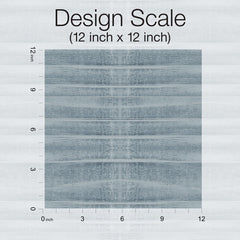 A square sample of Grey Stone Wallpaper in blue-grey with a horizontal wood grain pattern, shown against a 12-inch by 12-inch scale ruler.