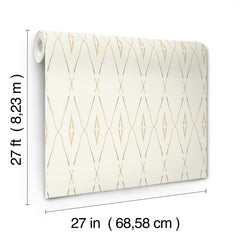 A roll of York Wallcoverings Artifact Silhouettes wallpaper featuring a repeating cream and tan geometric diamond pattern, with dimension lines indicating a height of 27 feet and a width of 27 inches.