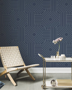Candice Olson Diverging Diamonds Wallpaper featuring a dark blue background with a geometric pattern of thin white lines forming interlocking diamonds.