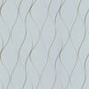 The Wavy Stripe Wallpaper by York Wallcoverings features a light gray background adorned with a repeating pattern of wavy, vertical golden and gray lines, creating an elegant, flowing design.