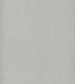 Featuring a light gray textured surface with subtle vertical streaks, York Wallcoverings’ Natural Texture Wallpaper offers the look of brushed metal or a painted wall. Its consistent pattern creates a neutral and minimalist backdrop suitable for any space.