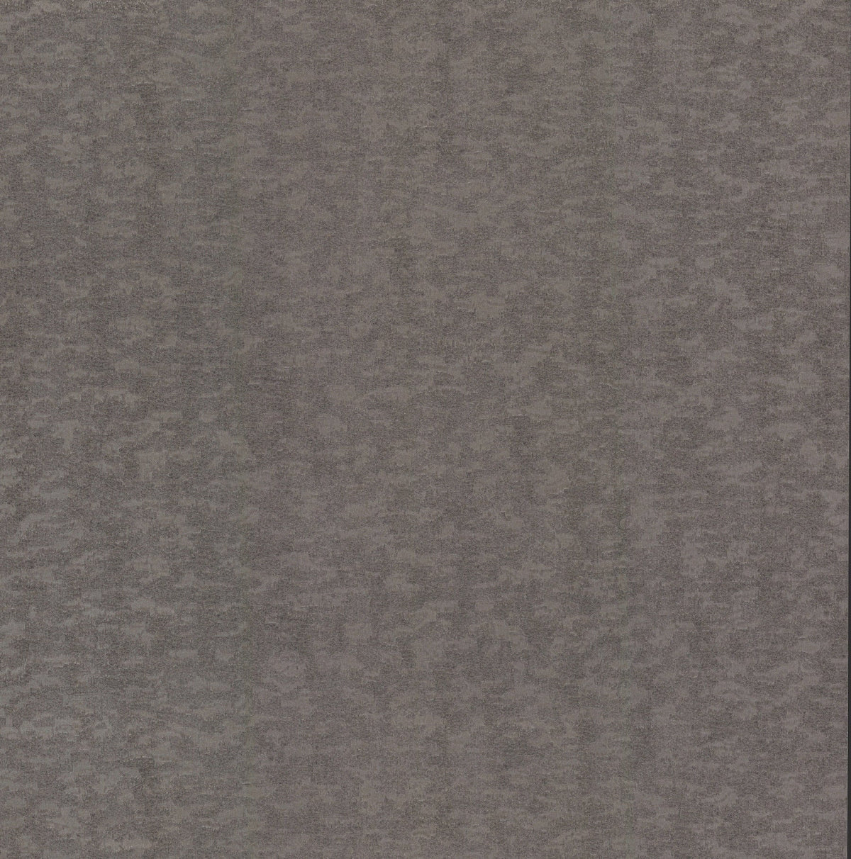 A close-up of York Wallcoverings’ Weathered Cypress Wallpaper, featuring a textured gray surface with a subtle, mottled pattern and faint vertical stripes that create slight color variations across the design.