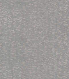 The Weathered Cypress Wallpaper by York Wallcoverings features a gray and light pink mottled texture reminiscent of soft, cloudy or marbled fabric. Its uniform, abstract pattern displays irregular, organic shapes scattered across the surface for a sophisticated and tranquil look.