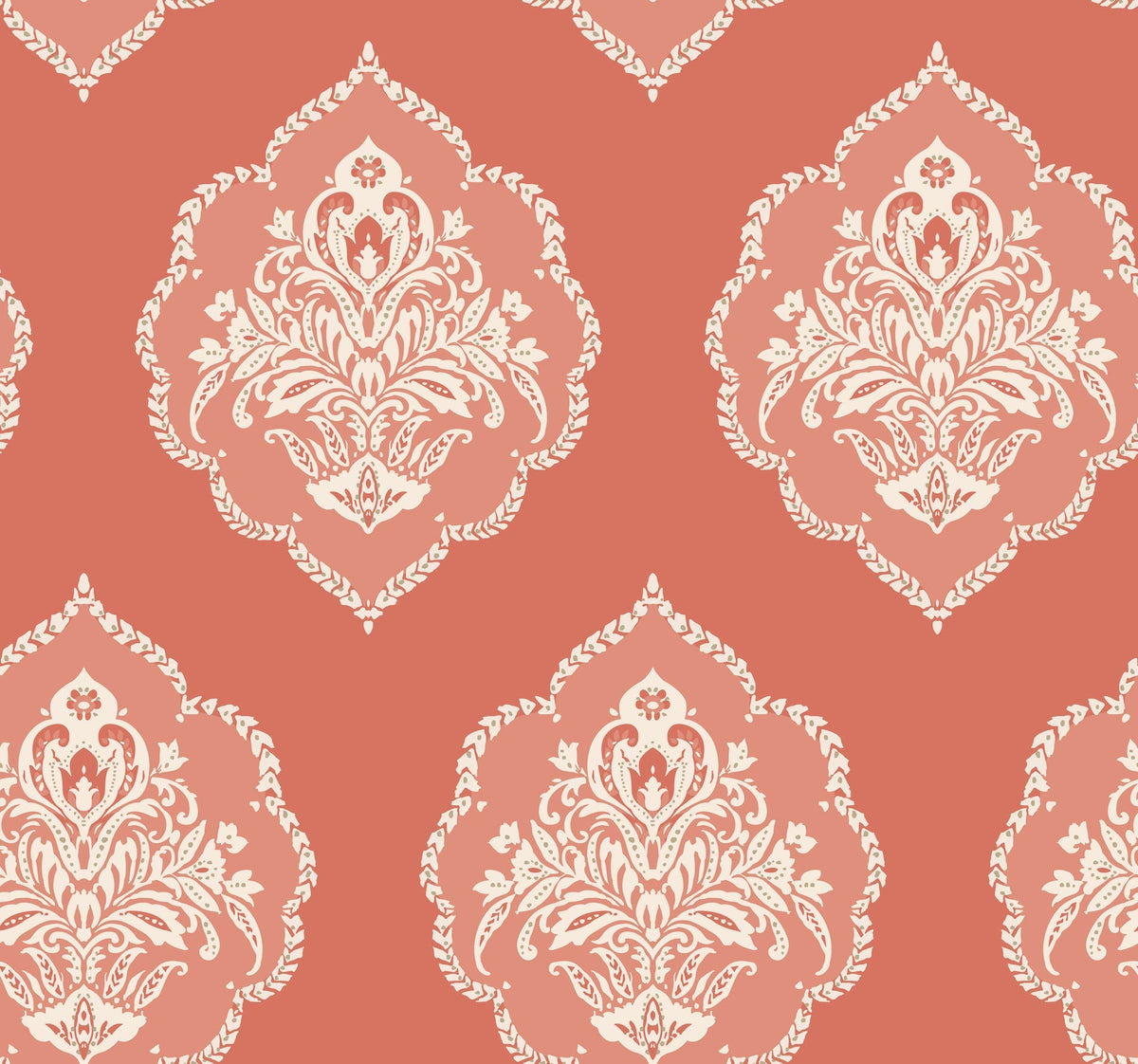 The Signet Medallion Damask Wallpaper by York Wallcoverings features an elegant, vintage-inspired design with ornate white floral motifs arranged in a seamless pattern over a muted coral background.