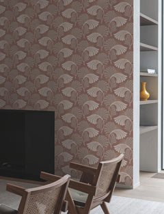 Candice Olson Dancing Leaves Wallpaper featuring a repeating pattern of stylized fan-shaped leaves in shades of cream and light brown on a dark mauve background.