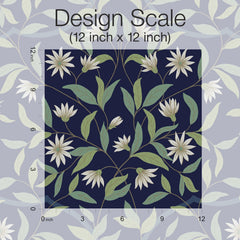A 12x12 inch square of Jasmine Wallpaper by York Wallcoverings, featuring a floral pattern with white flowers and green leaves on a dark background, is displayed over a lighter version of the same design. Rulers along the sides indicate inches for scale.