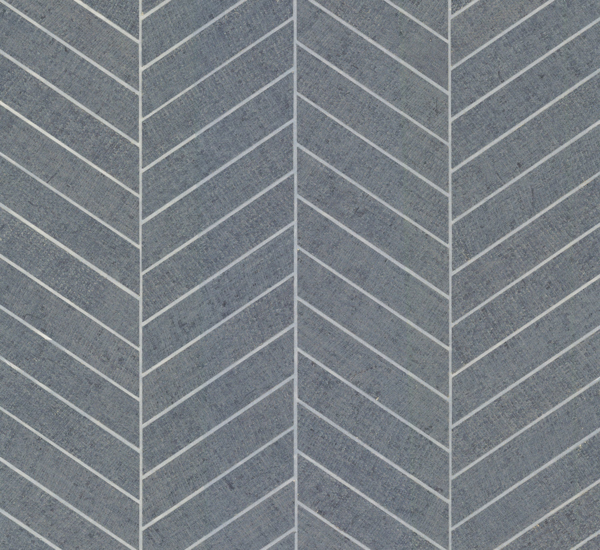 The Ronald Redding Atelier Herringbone Wallpaper by York Wallcoverings features a gray concrete surface accented with white diagonal lines in a repeating chevron pattern, creating a geometric and modern design.