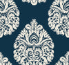 Ronald Redding Teardrop Damask Wallpaper featuring a repeating damask pattern of off-white teardrop-shaped floral motifs on a dark blue background.