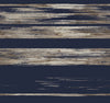 Ronald Redding Horizontal Dry Brush Wallpaper features horizontal bands of dark navy alternating with distressed, streaky beige and taupe brushwork.