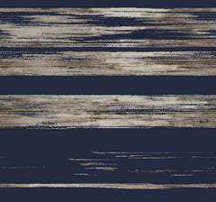 Ronald Redding Horizontal Dry Brush Wallpaper features horizontal bands of dark navy alternating with distressed, streaky beige and taupe brushwork.