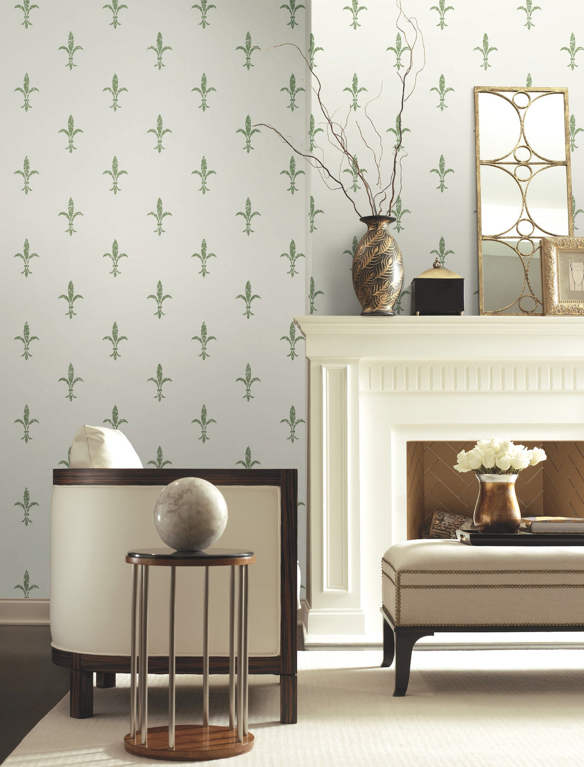 Ronald Redding Fleur De Lis Wallpaper featuring a repeating green fleur-de-lis pattern on a white background in a furnished room with a fireplace.