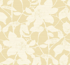 Transform your space with the Solange Botanical Wallpaper by York Wallcoverings, featuring a beige background adorned with a subtle white floral pattern of large flowers and leaves for a soft, textured, and elegant look.