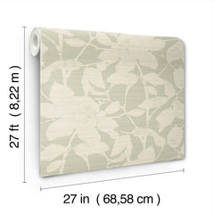 The Solange Botanical Wallpaper by York Wallcoverings features a light cream floral pattern on a pale green background. Each roll measures 27 feet (8.22 m) in length and 27 inches (68.58 cm) in width.