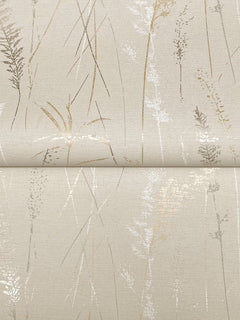 The Meadow Splendor Botanical Wallpaper features a beige background with a subtle, shimmering pattern of delicate grasses and reeds in gold and silver tones, creating a natural, textured appearance.