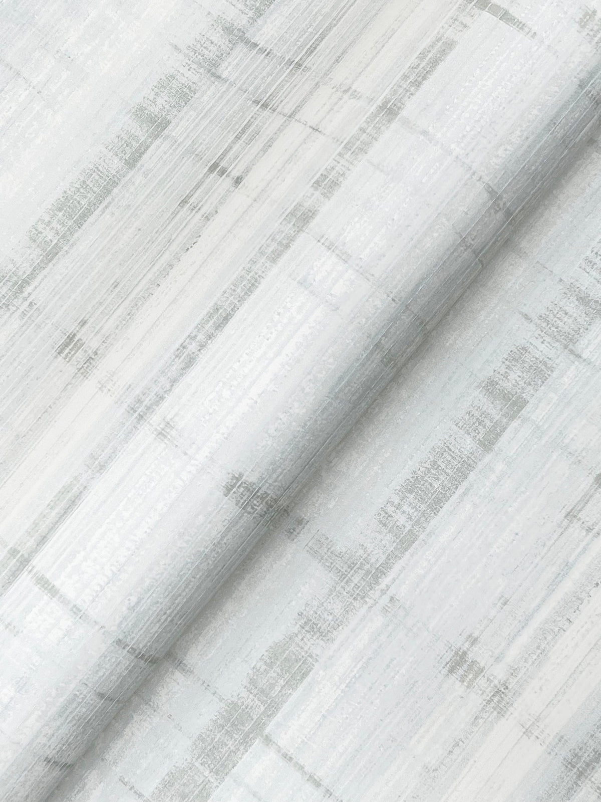 Close-up of Vanishing Point Striated Wallpaper by York Wallcoverings in light gray and white, featuring subtle, irregular lines and textured, abstract grid patterns, draped in gentle folds.