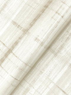A close-up of York Wallcoverings’ Vanishing Point Striated Wallpaper shows its light beige surface, featuring subtle intersecting lines that form a soft grid pattern for a modern and minimalist look.