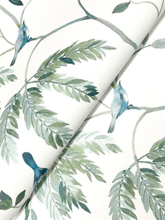 The Cillian Botanical Bird Trail Wallpaper by York Wallcoverings features a watercolor-inspired design of green leafy branches and blue-gray birds perched upon them, all set against a crisp white background.