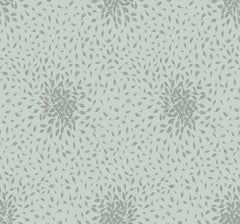 Petite Leaves Wallpaper by York Wallcoverings features a soft, repetitive botanical design of small, scattered gray leaves forming circular clusters on a pale blue background.