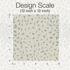 Petite Leaves Wallpaper by York Wallcoverings is shown in a 12 inch by 12 inch square pattern, featuring small gray leaves scattered on a light beige background. The image includes labels for the dimensions, with “Design Scale (12 inch x 12 inch)” displayed at the top.