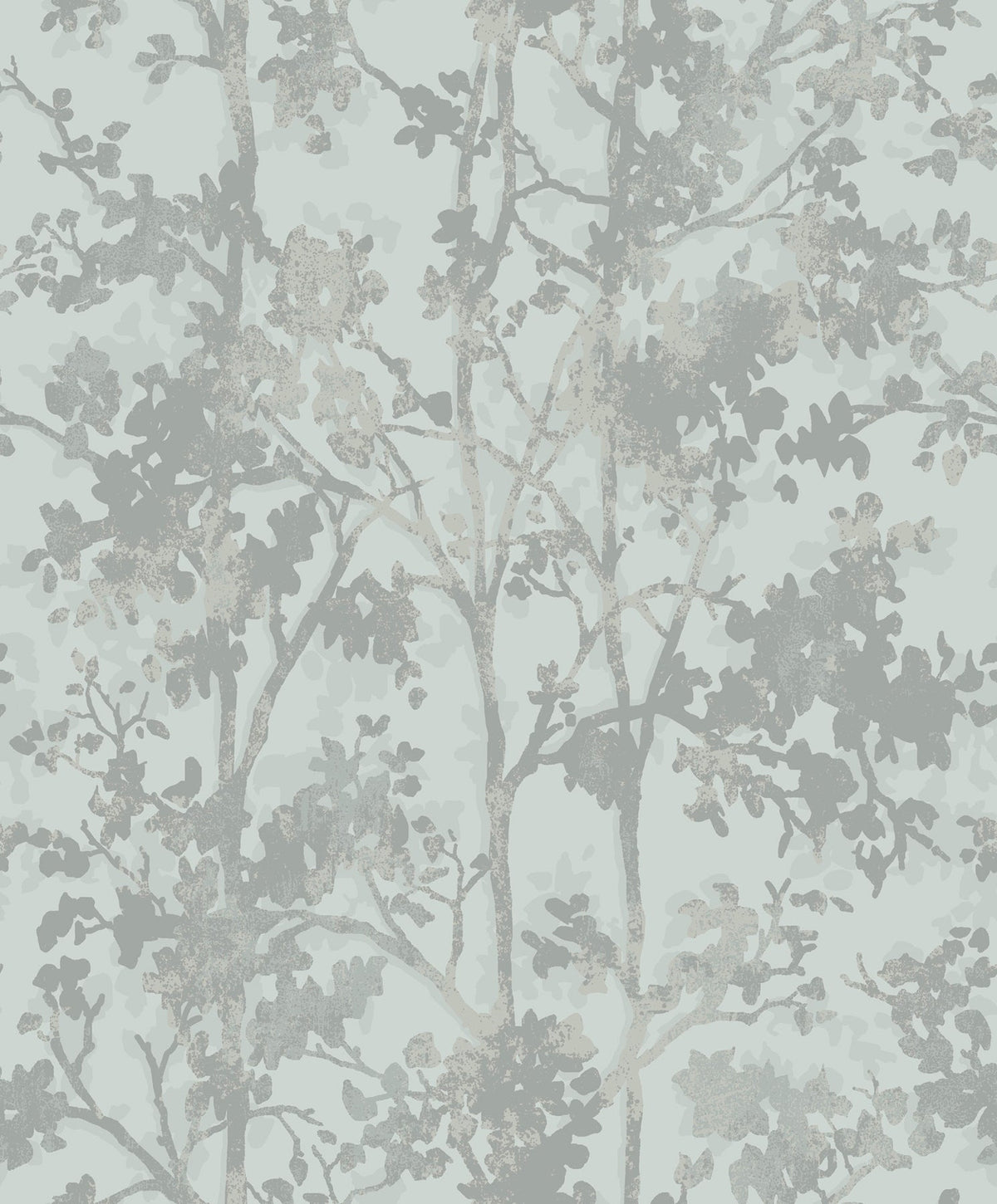 Shimmering Foliage Wallpaper by York Wallcoverings features a soft, muted pattern of tree branches and leaves in pale gray and blue tones on a light background, creating a subtle, nature-inspired design.