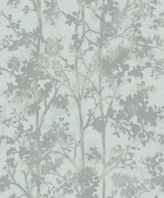 Shimmering Foliage Wallpaper by York Wallcoverings features a soft, muted pattern of tree branches and leaves in pale gray and blue tones on a light background, creating a subtle, nature-inspired design.