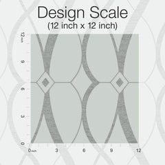 Graceful Geo Wallpaper by York Wallcoverings features a gray geometric pattern with overlapping curved lines and diamond shapes, shown here in a 12 inch by 12 inch scale with rulers marking inches along the left and bottom edges.