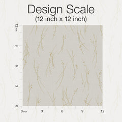 A 12x12 inch fabric swatch of York Wallcoverings’ Sprigs Wallpaper displays a light beige background adorned with a repeating pattern of thin, gold branches. A ruler along the left and bottom edges indicates the scale in inches.